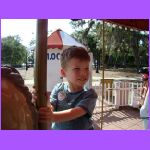 Noah on Merry Go Round.jpg